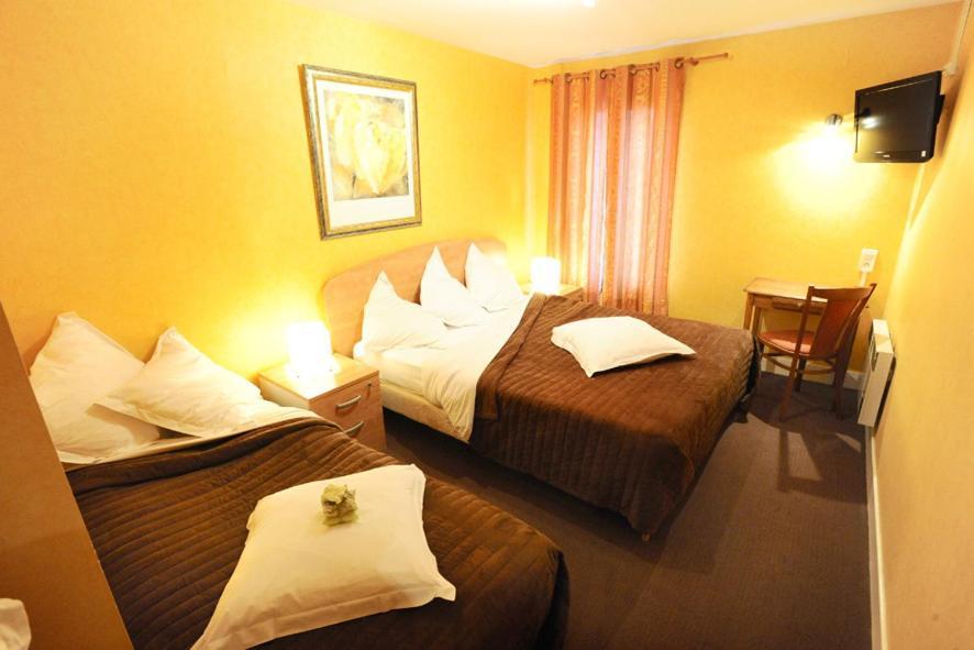 Les Negociants Hotell Pontgibaud Rum bild